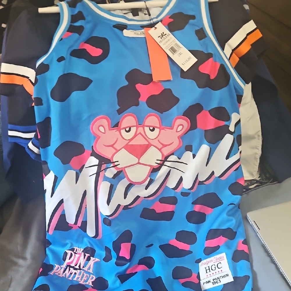 Blue and Pink Basketball Jersey with Bold Design